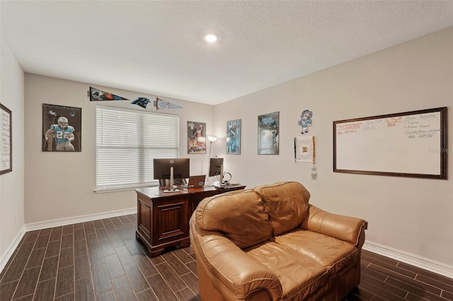 home office with a textured ceiling