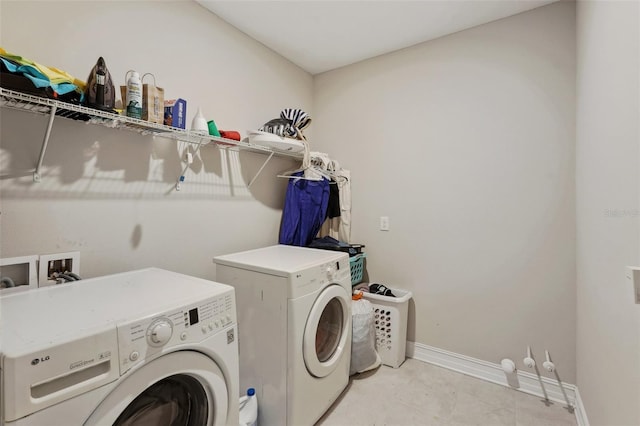 laundry room with washing machine and dryer