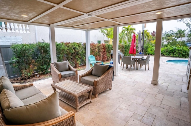 sunroom featuring coffered ceiling