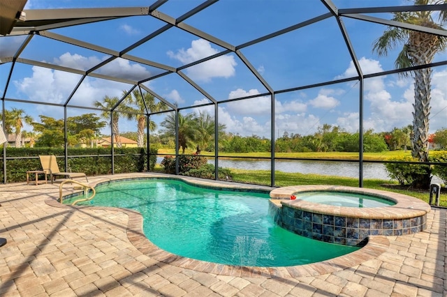 view of pool with a water view, glass enclosure, and a patio area