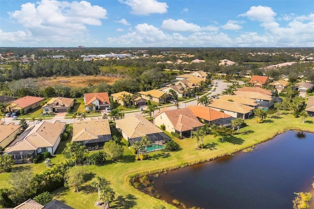 drone / aerial view with a water view