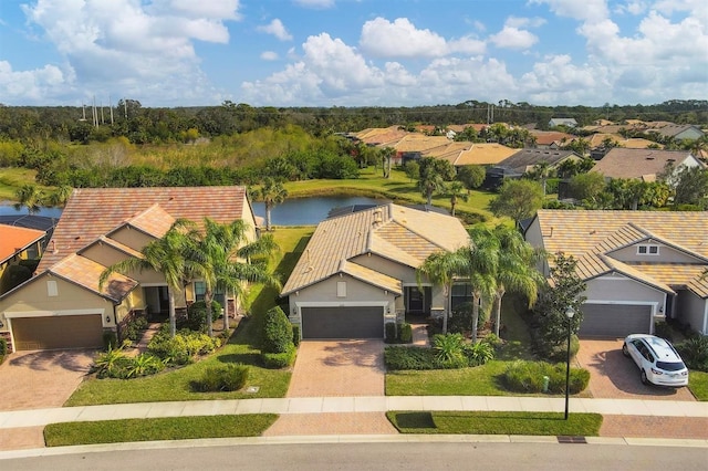 drone / aerial view featuring a water view