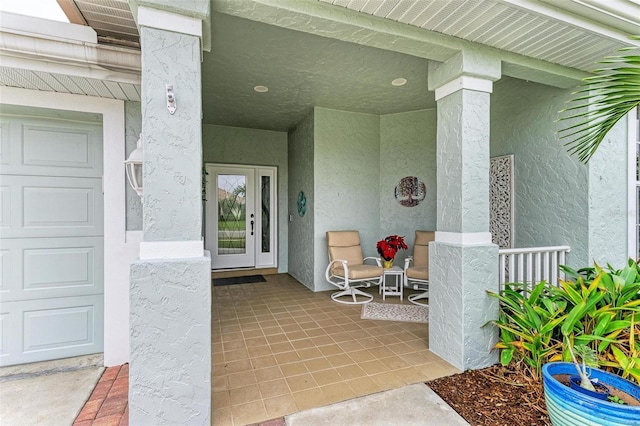 entrance to property featuring covered porch