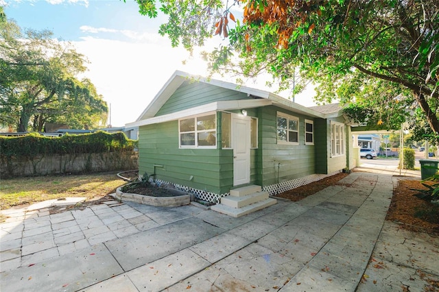 view of property exterior featuring a patio