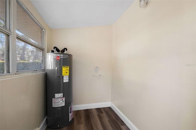 utility room featuring electric water heater