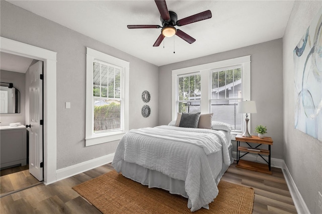 1010 E Lake Ave, Tampa, FL 33605 - bedroom with wood finished floors, baseboards, and ceiling fan