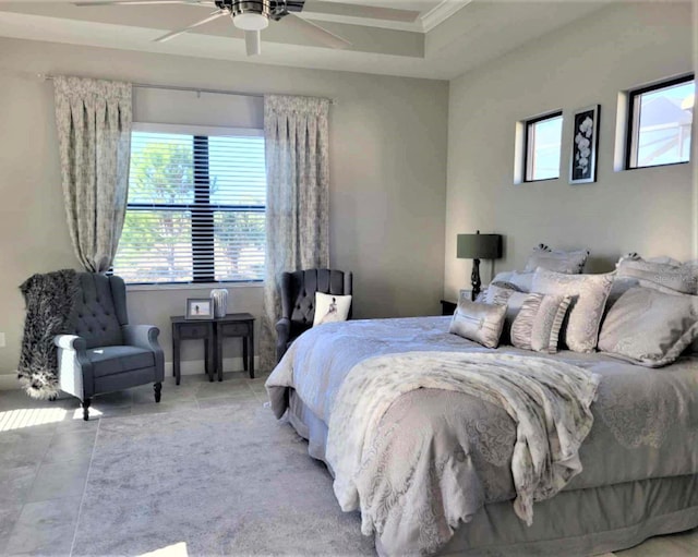 tiled bedroom featuring ceiling fan and ornamental molding