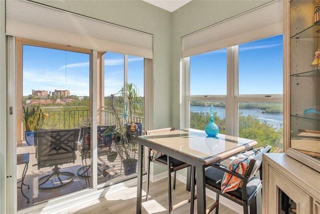 sunroom with a water view