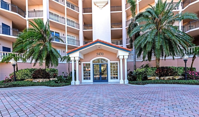 property entrance featuring french doors