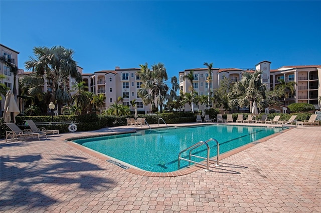 view of swimming pool with a patio area