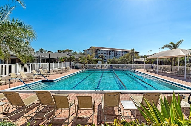 view of pool featuring a patio area