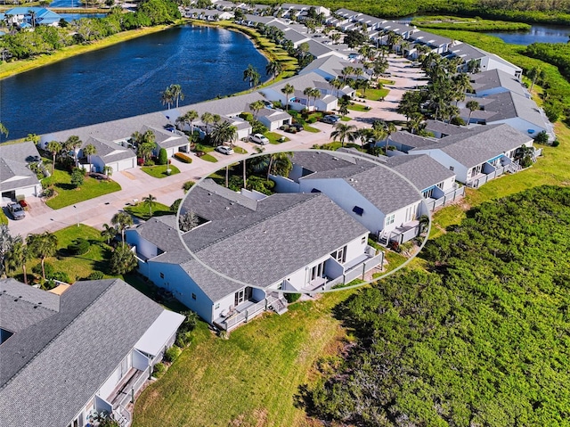 drone / aerial view featuring a water view