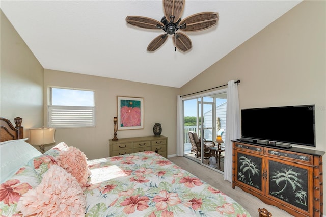 bedroom featuring ceiling fan, vaulted ceiling, and access to outside