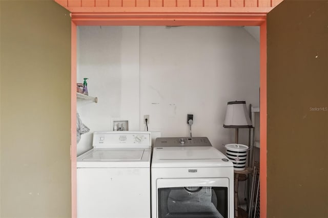 washroom with separate washer and dryer