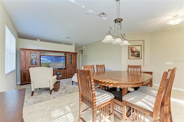 view of tiled dining space