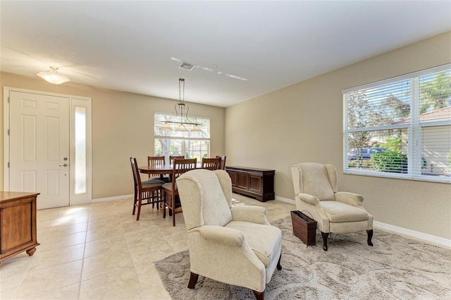 living area with light tile patterned floors