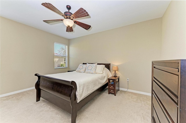 bedroom with light colored carpet and ceiling fan