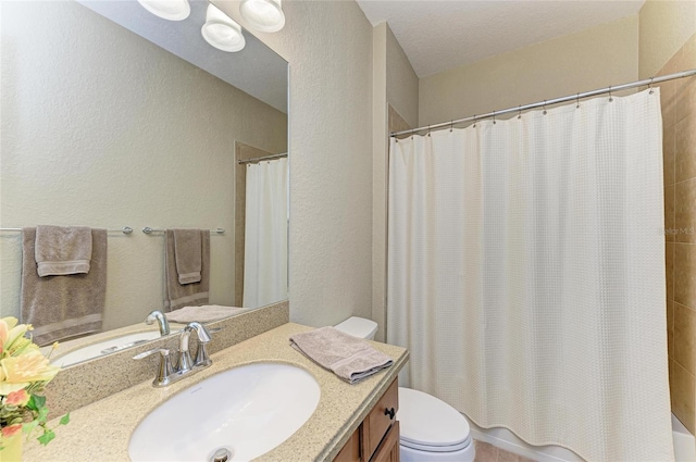 full bathroom with vanity, toilet, and shower / bath combo with shower curtain