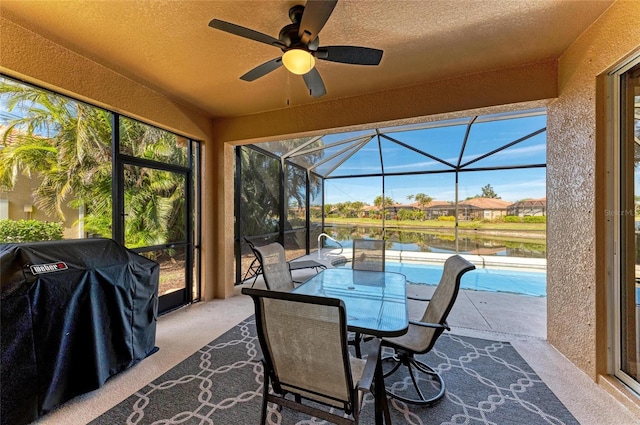 sunroom with ceiling fan and a wealth of natural light