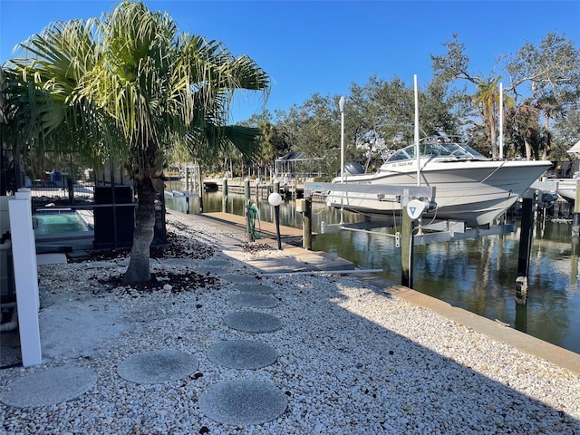 dock area with a water view