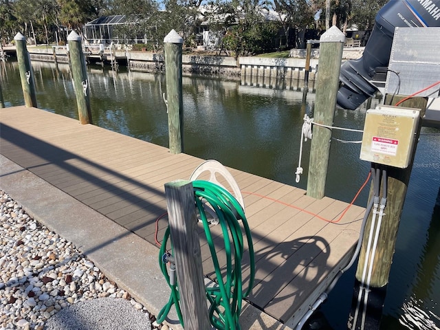 dock area featuring a water view