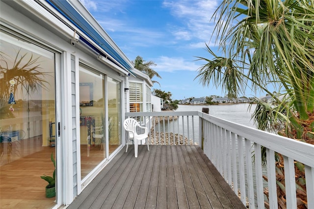 deck featuring a water view