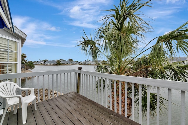 deck featuring a water view