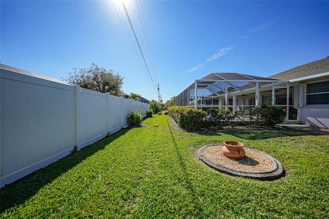 view of yard featuring a lanai