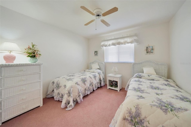 bedroom featuring dark colored carpet and ceiling fan