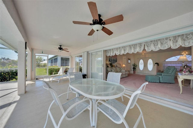 view of patio featuring ceiling fan