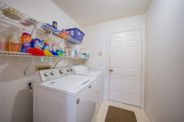 washroom with washer and clothes dryer