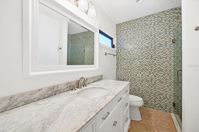 bathroom featuring walk in shower, tile patterned floors, vanity, and toilet