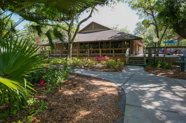 view of community with a wooden deck