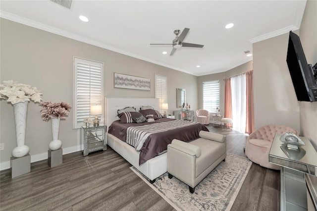 bedroom with ceiling fan, ornamental molding, and dark hardwood / wood-style floors