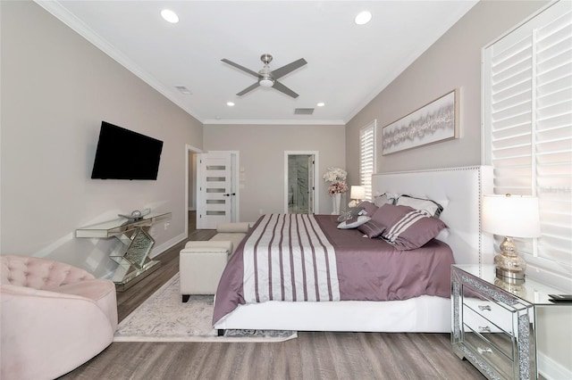 bedroom featuring crown molding, ceiling fan, and light wood-type flooring