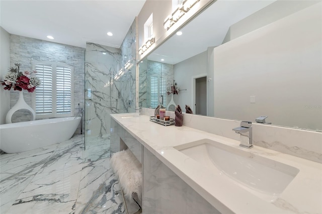 bathroom featuring vanity and a bathing tub