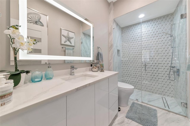 bathroom with vanity, toilet, and walk in shower