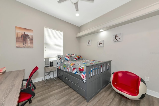 bedroom featuring ceiling fan and wood-type flooring