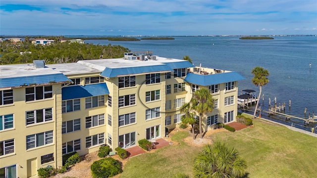 drone / aerial view featuring a water view