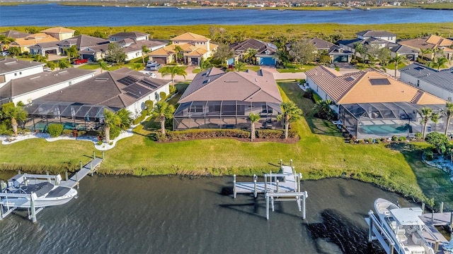 bird's eye view with a water view