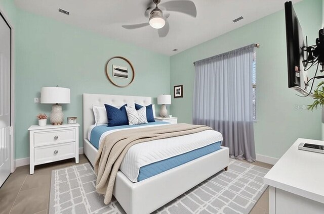 5607 Tidewater Preserve Blvd, Bradenton, FL 34208 - bedroom featuring baseboards and ceiling fan