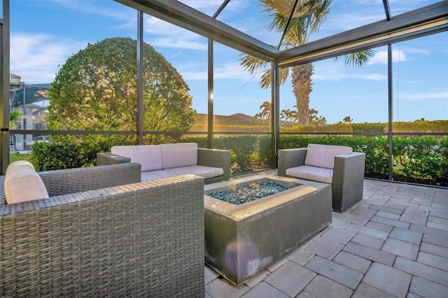 5607 Tidewater Preserve Blvd, Bradenton, FL 34208 - sunroom featuring an outdoor living space with a fire pit
