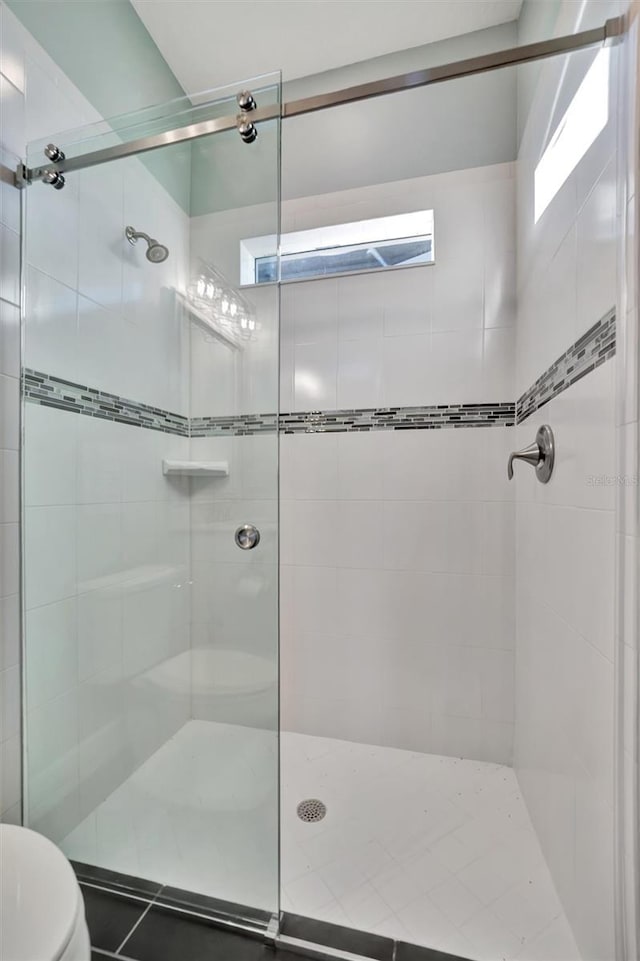 5607 Tidewater Preserve Blvd, Bradenton, FL 34208 - full bath with a shower stall and tile patterned flooring