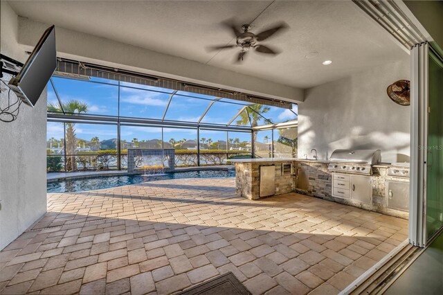 5607 Tidewater Preserve Blvd, Bradenton, FL 34208 - view of patio with area for grilling, a ceiling fan, an outdoor pool, and a lanai