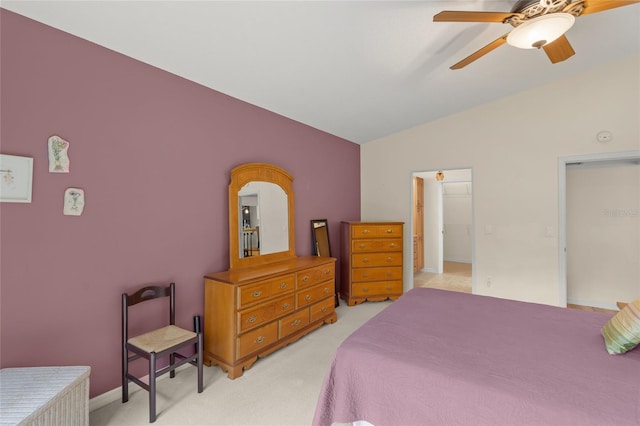 bedroom featuring ceiling fan, light colored carpet, and lofted ceiling