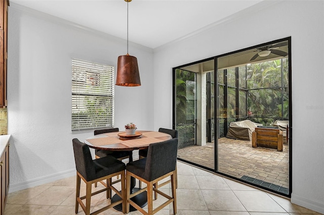 dining room featuring light tile patterned flooring and ceiling fan