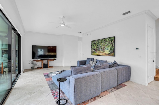 tiled living room featuring crown molding and ceiling fan