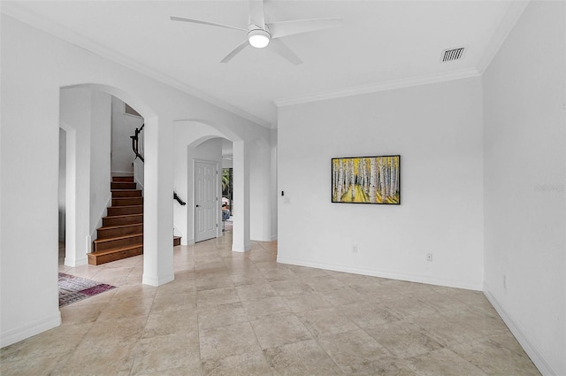 unfurnished room featuring crown molding and ceiling fan