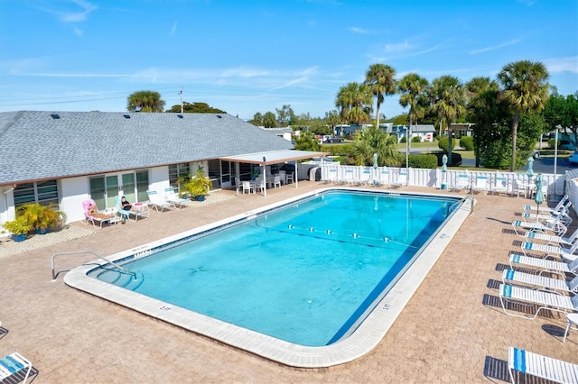 view of swimming pool featuring a patio