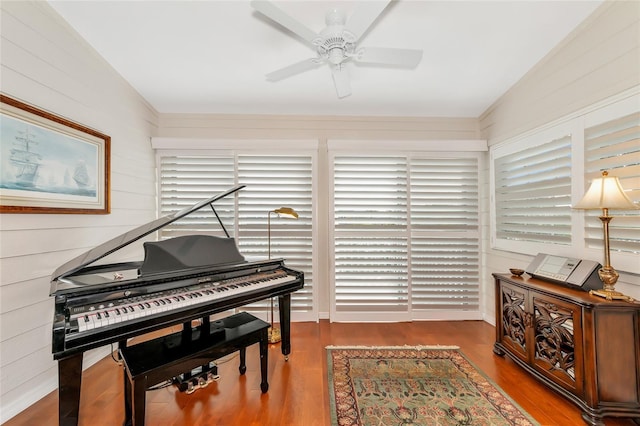 misc room featuring hardwood / wood-style flooring, vaulted ceiling, and ceiling fan